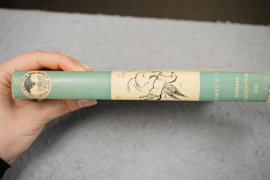 Lewis C.S - The Magician's Nephew, 1st edition, 8vo, illustrated by Pauline Baynes, original cloth, in unclipped d/j, The Bodley Head, London, 1955